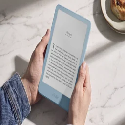 Person holding aluminium Kindle with both hands
