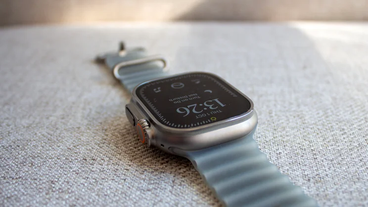 Apple Watch Ultra 4 seen from the top with the Digital Crown and side button nearest the camera