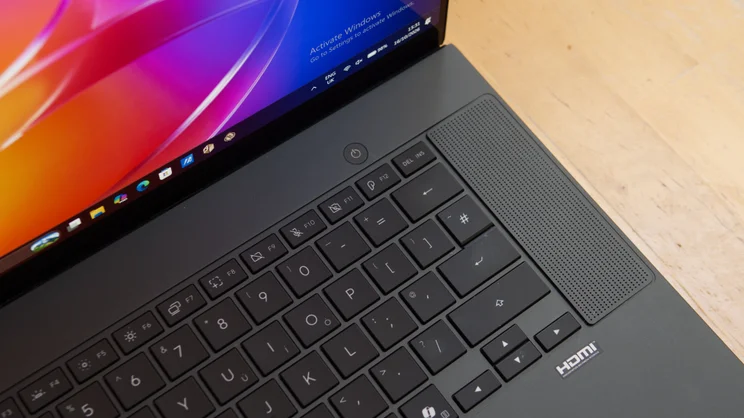 Close-up of the top-right of the Asus ProArt P16 RTX Spark laptop keyboard, showing the power button, function keys, Enter and arrow keys, the speaker grille and the HDMI logo.
