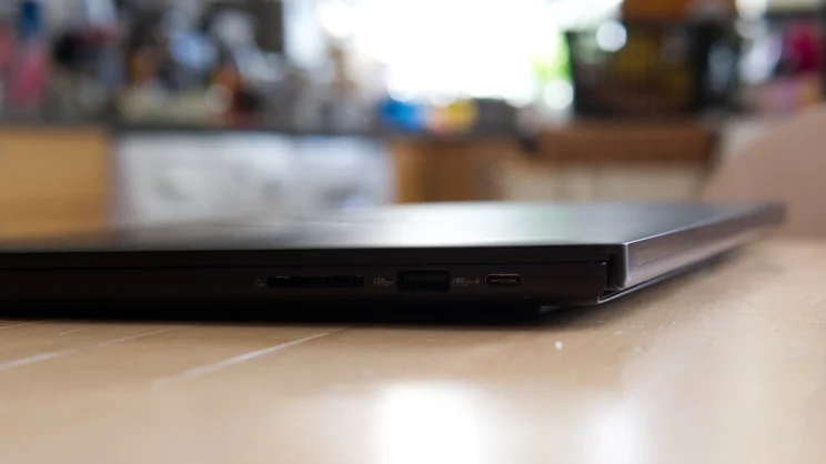 Right side of the closed Asus ProArt P16 RTX Spark laptop, showing an SD card slot, a 10Gbps USB-A port and a 40Gbps USB-C port beside the hinge.