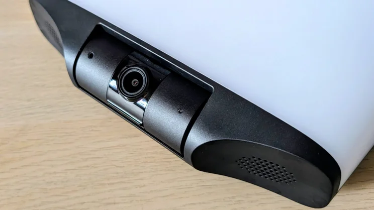 Close-up of the camera lens module and perforated speaker grille at the bottom of the Eufy S4 4K Solar Wall Light.