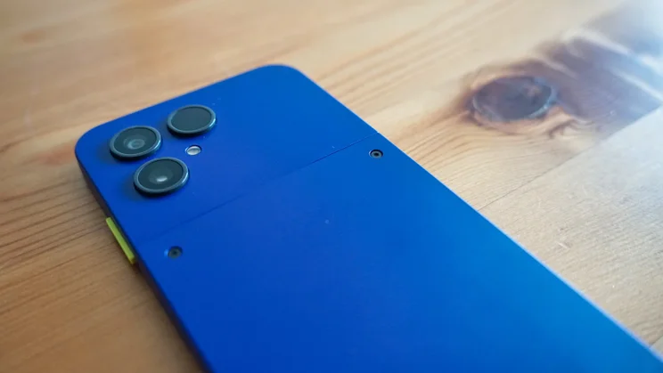 Fairphone 6 Plus face down on a table, angled view