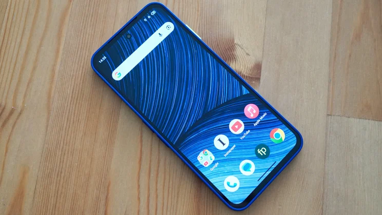 Fairphone 6 Plus faceup on a table, displaying the homescreen