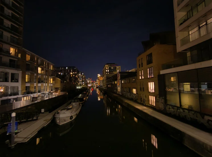 Wide-angle shot of a river at night