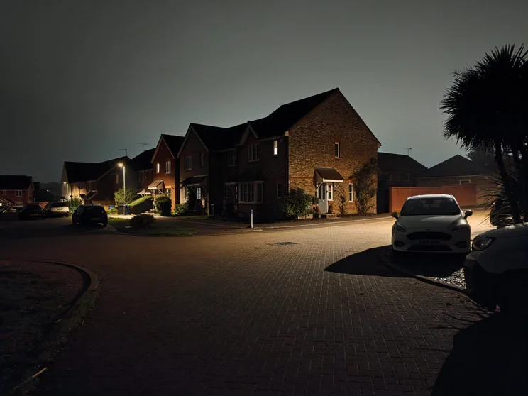 A quiet close of houses at night