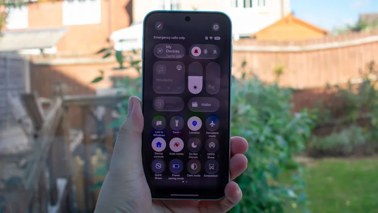 Oppo Find X10 Pro Max in hand, displaying the control centre