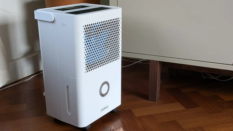 The Vonhaus 12l dehumidifier on the floor of a living room