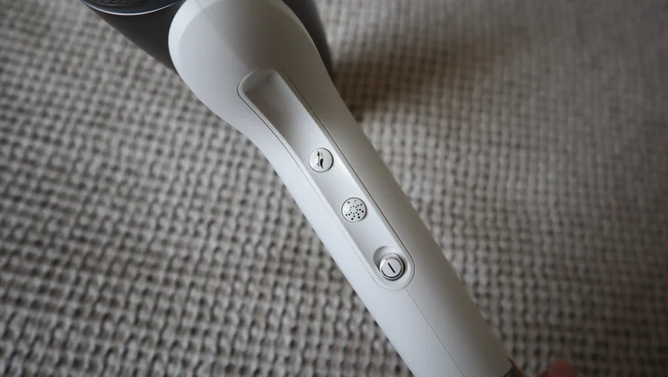 A closeup of the GHD Speed Ionic hair dryer's controls